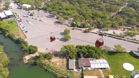 Close-up flight next to the uphill funicular with the coast in the background 4K Stock-Footage 143916132