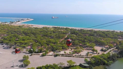 Close-up flight next to the uphill funicular with the coast in the background 4K Stock-Footage 143916304