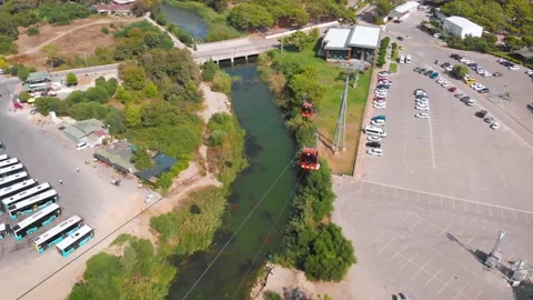 Close-up flight next to the uphill funicular with the coast in the background 4K Stock-Footage 143916472