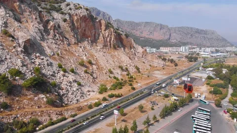 Close-up flight next to the uphill funicular with the coast in the background 4K Stock-Footage 143916511