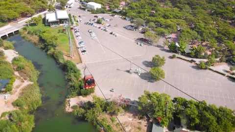 Close-up flight next to the uphill funicular with the coast in the background 4K Video stock 143916602