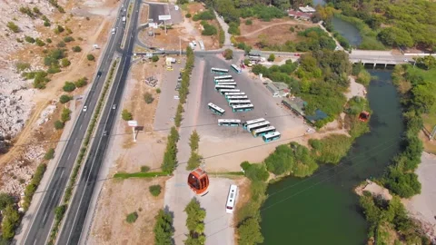 Close-up flight next to the uphill funicular with the coast in the background 4K Stock-Footage 143916702
