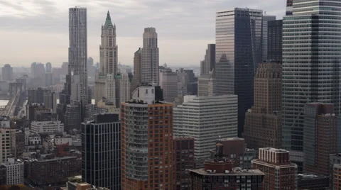 Close flight past the Financial District in Lower Manhattan, heading south. Shot Stock Footage 59165681