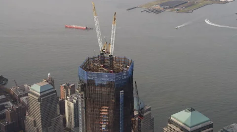 Close flight past Freedom Tower under construction, New York Harbor islands in Stock Footage 59166610