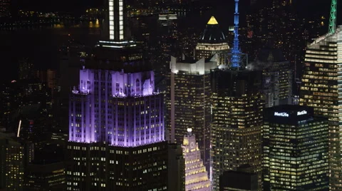 Close flight past Midtown Manhattan skyscrapers at night. Shot in 2011. Stock Footage 59530190