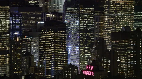 Close flight past Midtown Manhattan skyscrapers at night. Shot in 2011. Stock Footage 59530325