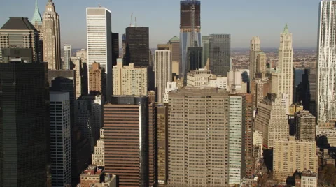 Close flight past the New York Financial District from the East River side. Shot Stock Footage 59177559