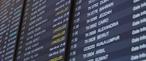 Close up of flight schedule board with canceled flights information Stock Footage 130320383
