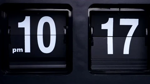 Close-up Flip clock White numbers on black background startime 10.00 pm. Stock Footage 147246432