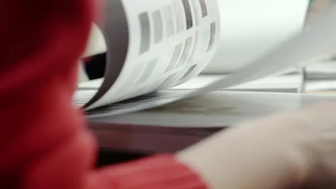 Close-up of a flipping through a catalog. Stock Footage 194793228