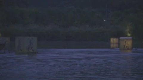 Close-up of Floating Calligraphy Lanterns on River Surface Night Stock-Footage 343552675