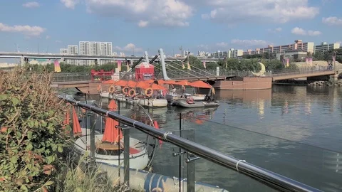 Close up of a floating table and reveal shot of floating tables docked by Stock Footage 95483406