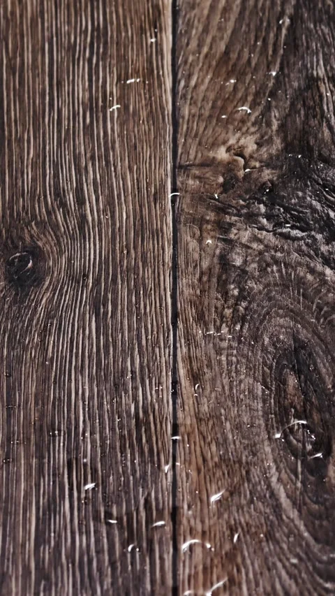Close-up of the floor onto which water is dripping from a leaking ceiling. Stock Footage 324791734