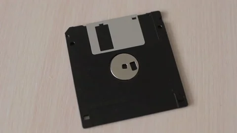 Close-up of floppy disc. Obsolete computer technology. Stock Footage 144253317