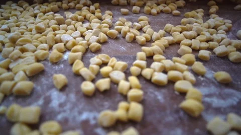 Close up of floured struffoli on board Video stock 277516102