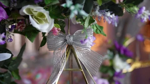 Close up of a flower arrangement with a bow Stockbeeldmateriaal 266439409