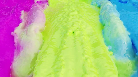 Close up of flowing multicolor water. multicolor water looping background Video stock 279561890