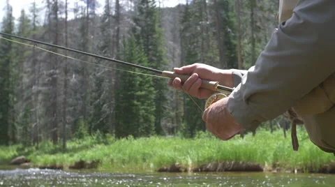 Close up of fly fishing casting Stock Footage 56566149