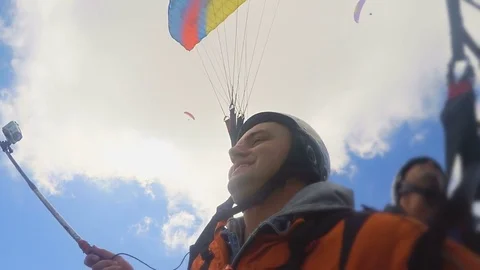 Close up of fly paragliders. Men Video stock 71892710