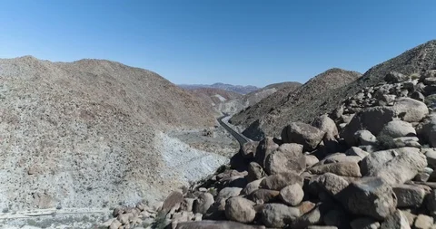 Close flyover rocks on Highway 8, California drone aerial 4K Stock Footage 111308430