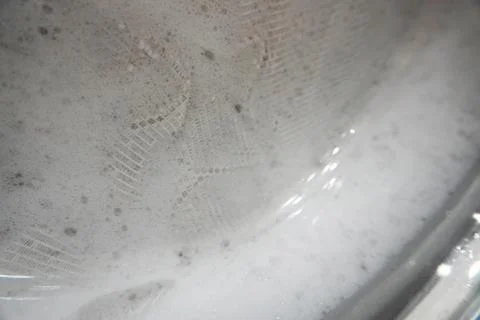 A close-up of foam in the car, rotating soapy water creates Stock-Fotos