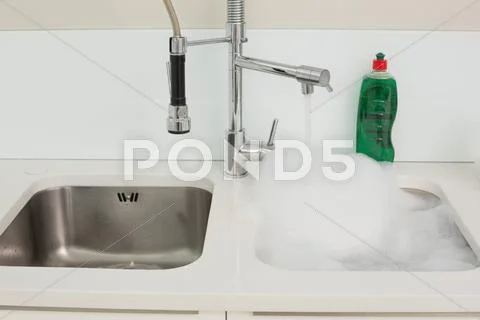 Close up of foam in kitchen sink Stock Photos
