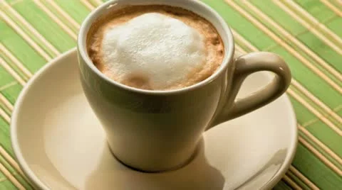 Close up of a foamy cappuccino coffee Stockbeeldmateriaal 21317652
