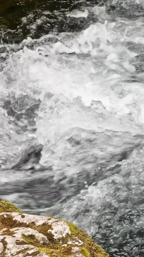 Close-up of foamy Golling Waterfall outflow in Austria, with fast whitewater Stock Footage 342999254