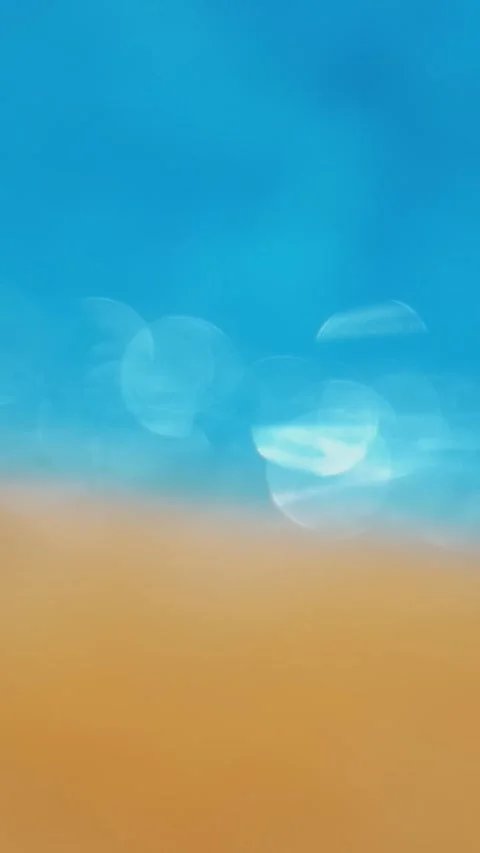 Close-up, focus in blur, two elements, water and sand in sunlight, reflections Stock Footage 305693448