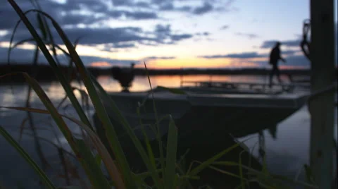 Close focus with a boat and sunset Stock Footage 50440852