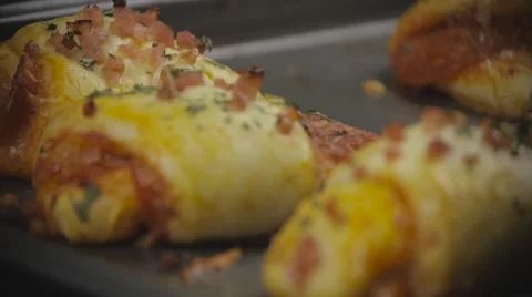 Close up Focus Shift of Pizza Rolls on Pan Stock Footage 61323787