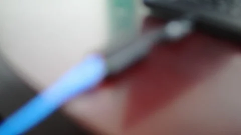 Close up focus shot of Dell USB-C Ethernet adapter operating Vídeos de archivo 102190312