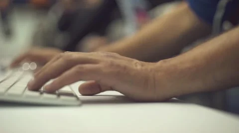 Close focus view on bearded hipster freelancer man working on his computer with Video stock 68940497