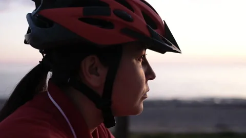 Close-Up of Focused, Motivated, Confident Face of Female Cycling Sportsman in Stock Footage 196226987