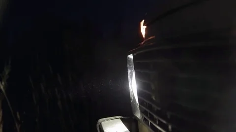 Close up of font of the car with headlights turned on at night. Stock-Footage 78626188