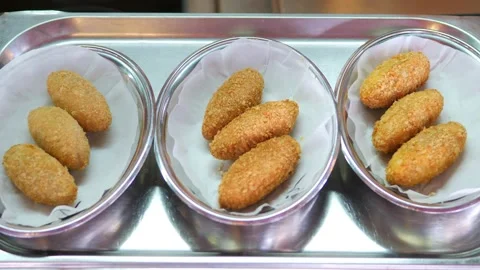 Close - up of the food. Ready-made cutlets after deep-frying on a plate. Stock Footage 154741630