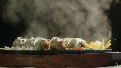 Close Up Food on Round Table With Smoke Black Background Stock Footage 200952936
