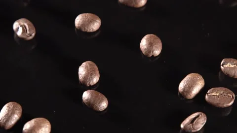 Close-up Food Video of Thrown Coffee Beans in Black Background Видео 201284277