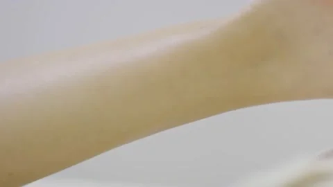 Close-up of a foot getting massaged at spa Stock Footage 138061834