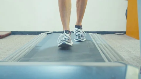 Close-Up of Foot Walking On Treadmill Stock Footage 162088460