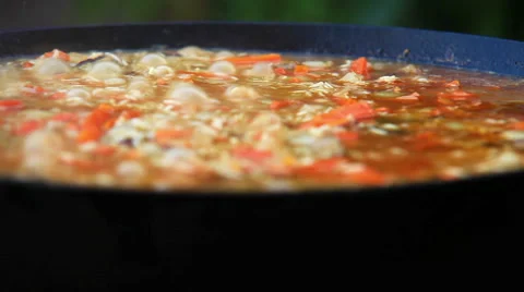Close-up footage of a boiling plov (pilaf) - a traditional middle-East dish Stock-Footage 59677203