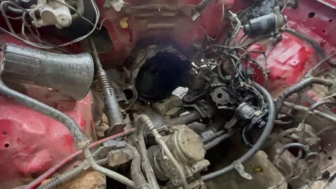 Close-up footage of a car engine bay with the engine removed,  스톡 동영상 343622074