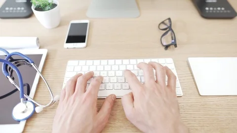 Close Up Footage of Doctor Using Computer . Stock Footage 127163367
