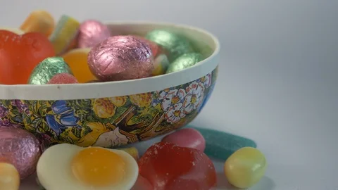 Close up footage of Easter Egg filled with candy Stock Footage 128986750