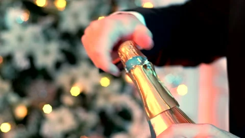 Close up footage of an elegant man opening champagne Stock Footage 221867033