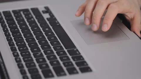 Close up footage of fingers on computer touch pad Stock Footage 102758372