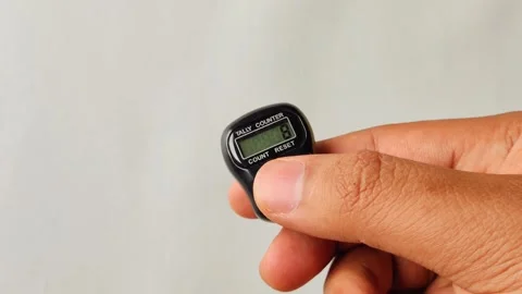 A close-up footage of a hand using digital prayer beads Video stock 311381109