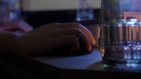 Close-up Footage of Hands Typing and Using Mouse on a Computer Desk 库存影片 252240524