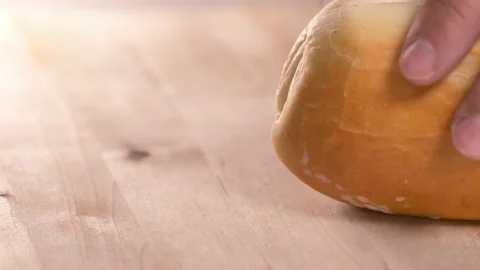 Close up footage of just baked roll cutted into slices. Video stock 138316341