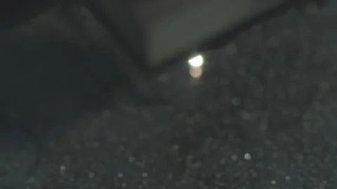 Close up footage of a laser engraving machine working Stock Footage 147888872